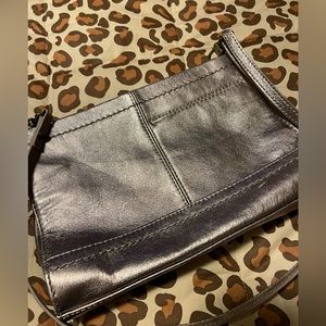 The Sak crossbody bag genuine silver metallic leather new never used